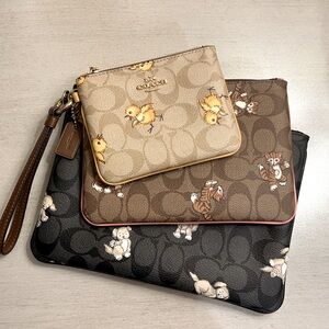Set of 3 Coach Signature Wristlets.